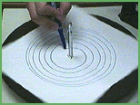 Pushing marker, creating spiral (17k)